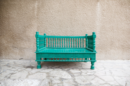 Turquoise bench of handmade on the street of Dubaiの写真素材