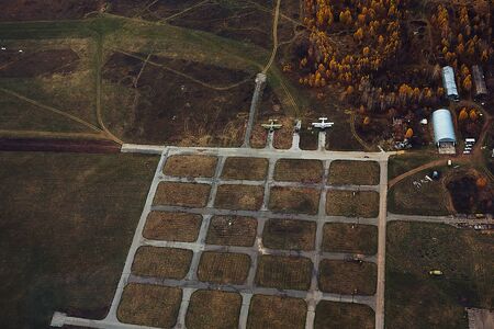 aircraft runway, airplanes, fields and suburbs, top viewの写真素材