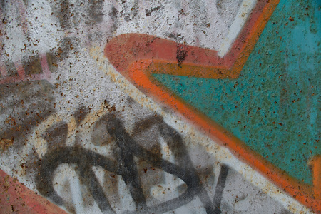 Texture of old wall with colorful graffitiの写真素材