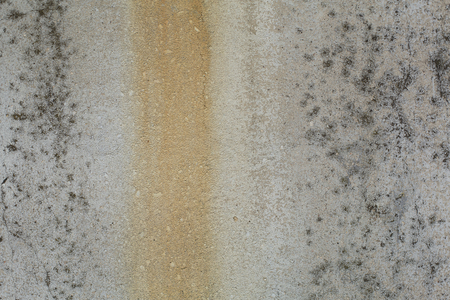 Old gray rusty rough concrete wall textureの写真素材