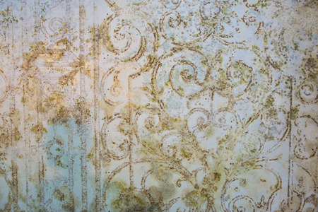 Old wallpaper with retro grungy flower motifs backgroundの写真素材