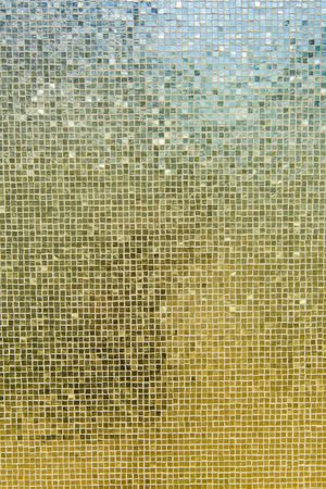 small golden tiles surface closeup background patternの写真素材