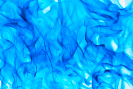 Blue fire closeup dancing flames background patternの写真素材