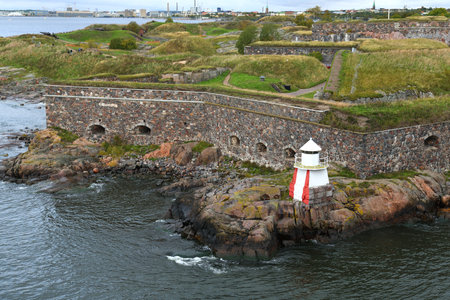 Lighthouse on rocky shore of Suomenlinna fortress. Helsinki, Finlandのeditorial素材