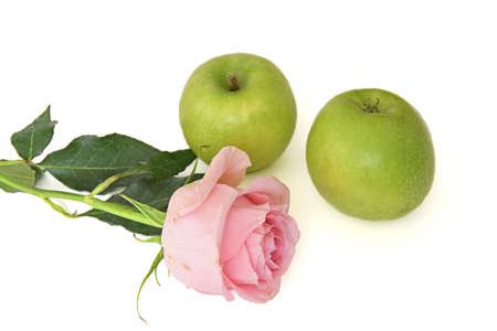 Beauty and health - pink rose with water drops and Granny Smith applesの写真素材
