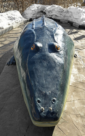 Mastodonsaurus (breast tooth lizard), extinct genus of temnospondyl amphibian from Middle Triassic, in spring among snowのeditorial素材