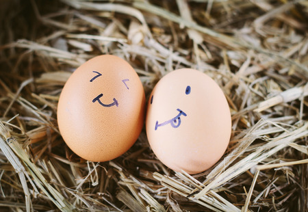 Painted  eggs about emotion on the faceの写真素材