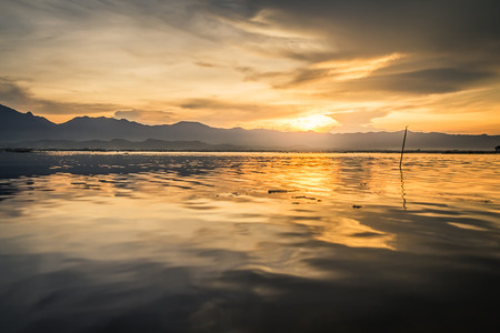 sunset time, at Kwan Phayao lake, Phayao province, Thailandの写真素材