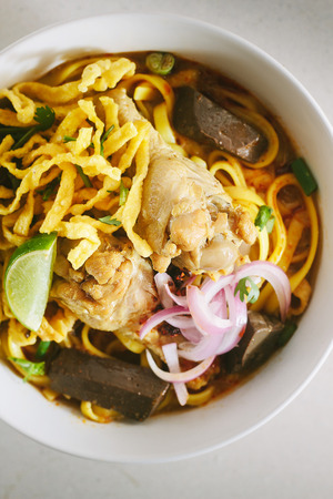 Curried Noodle Soup Khao soi with coconut milk, Northern Thai cuisine.の写真素材