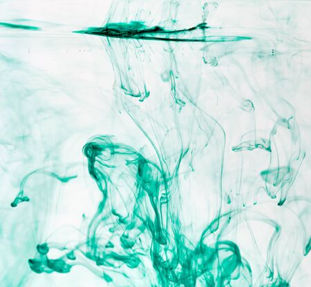 The colorful ink into the water while in motion,  Abstract, background, Wallpaper, Concept artの写真素材