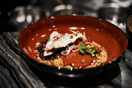Beautiful and tasty food on a plate, exquisite dish, creative restaurant meal concept, selective focusの写真素材