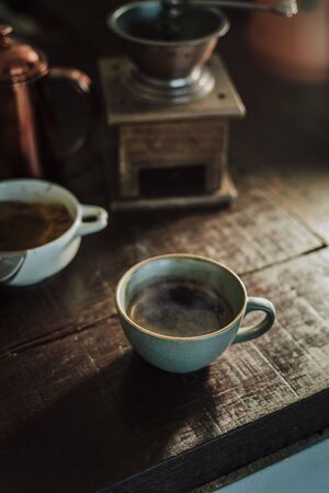 Cup of coffee americano on wood bar.の写真素材