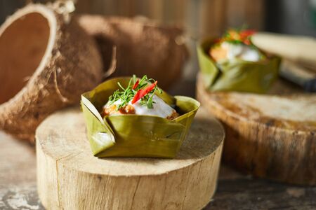 Streamed pork curry in a banana leaf cup.
の写真素材
