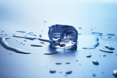 ice cubes on blue background.の写真素材