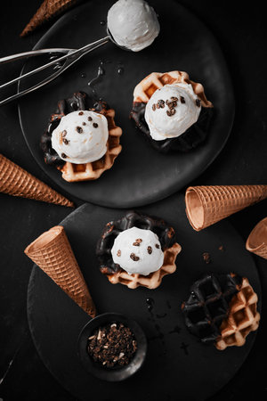 fresh waffle with ice cream and caramel sauce.