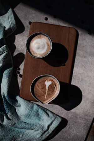 Hot latte art coffee,focus at white foam.