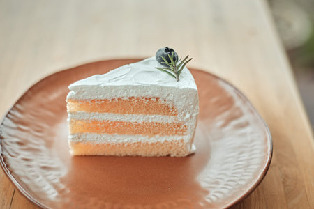 Milk cake delicious on the wood table.
