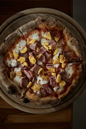 Pizza with bacon and sausage topping.の写真素材