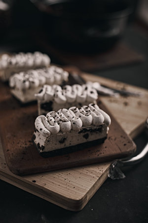 homemade cheesecake on dark background.
