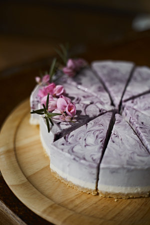 Blueberry cheesecake on wooden table