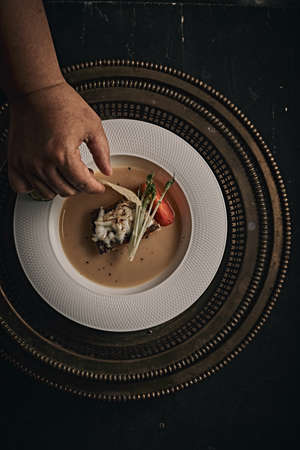 Beautiful and tasty food on a plate, exquisite dish, creative restaurant meal conceptの写真素材