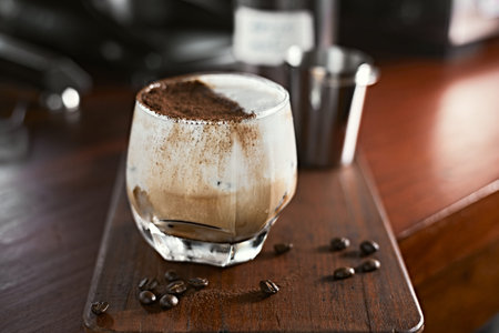 Iced coffee vanilla latte with milk foam.selective focus