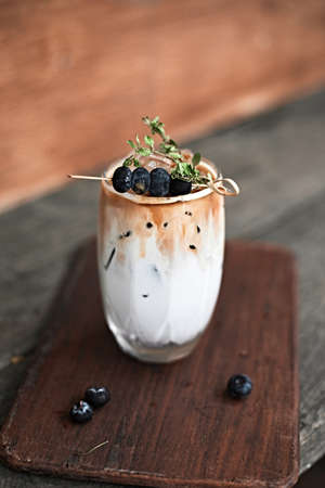 iced latte coffee in a glass with cold milk.の写真素材