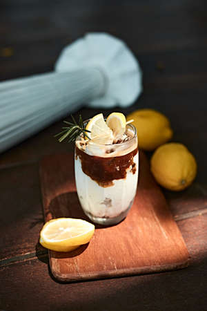 Iced latte coffee in a glass with cold milk,selective focusの写真素材