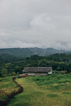 cottage on mountain in a rainy day huts on the mountainの写真素材