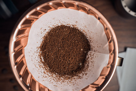 coffee powder in the dripper for make coffee filter on scales.の写真素材