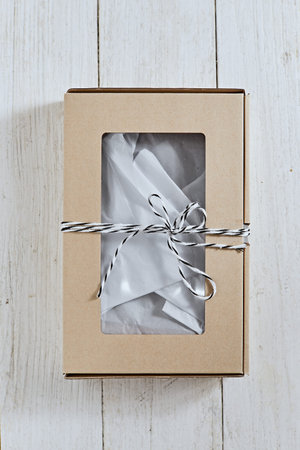 Craft gift box on background,creating a romantic luxury atmosphere. For birthday, anniversary...