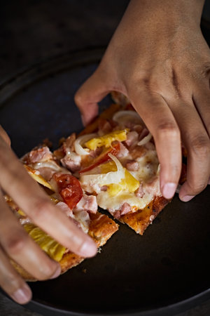 Sliced and served hawaiian mini pizza ,selective focusの写真素材