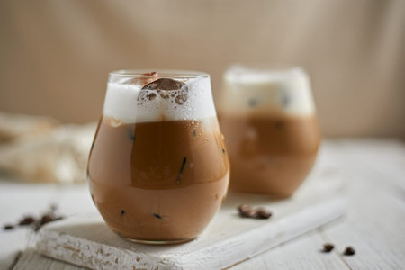 Iced cappuccino and milk foam, selective focus
