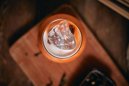 Iced thai milk tea in glass, selective focusの写真素材