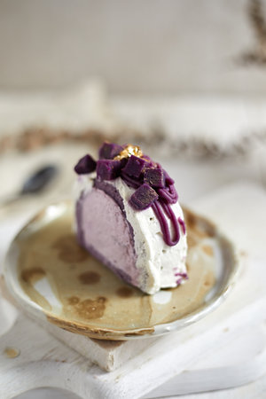 Purple sweet potato roll cake, selective focusの写真素材
