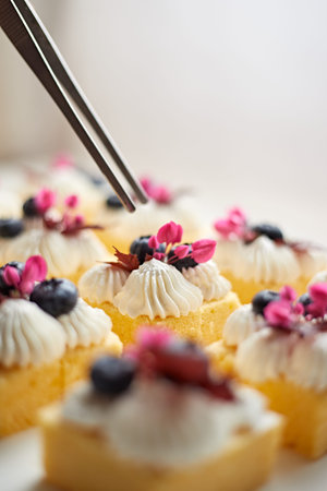 mini butter cake with whipped cream, selective focus