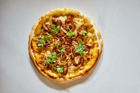 Grilled Chicken Pizza with Red Onion and Cilantroの写真素材
