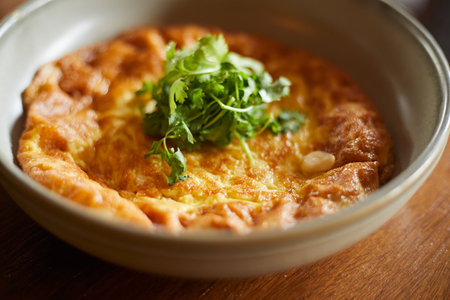 Traditional Thai omelette with coriander, selective focusの写真素材