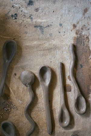 Close up clay spoon on  rustic background ,selective focusの写真素材