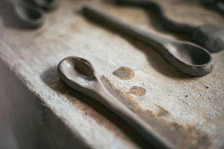 Close up clay spoon on  rustic background ,selective focusの写真素材