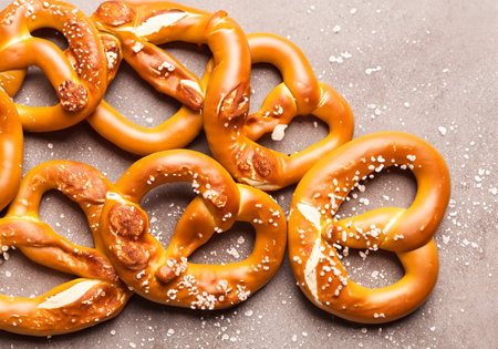 Homemade baked pretzel on tableの素材