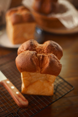 Japanese Shokupan bread loaf with wooden background