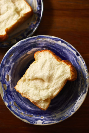 fresh bake breads whole wheat sliced close up. cut toast white bread loaf of fluffy grain texture...