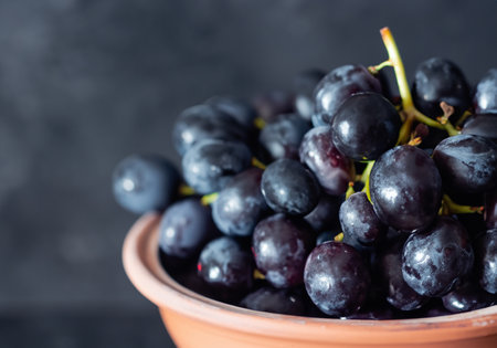 Close up with ripe black grapesの素材
