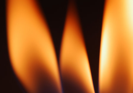 Burning match on a black backgroundの素材