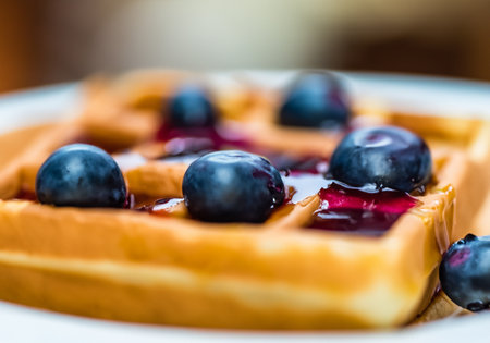 Close up Waffles with syrup and blueberriesÂ , blur backgroundの素材