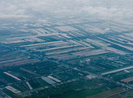 Aerial view of cityscape under cloudsÂ の写真素材