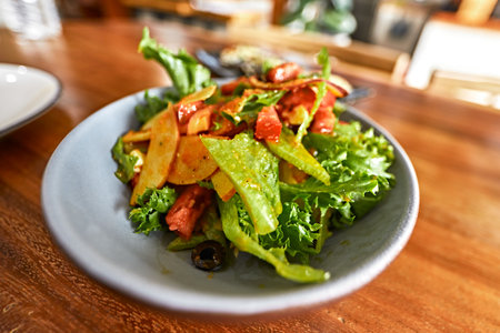 Feta Cheese Salad with vegetables on a wooden tableの写真素材