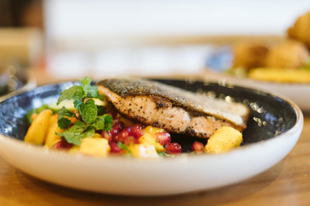 Grilled salmon with mango salsa, selective focusの写真素材