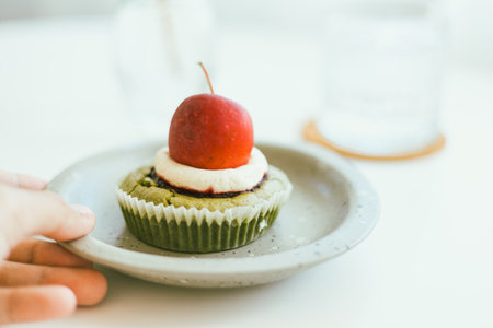 Matcha green tea cookies on cafe table.の写真素材